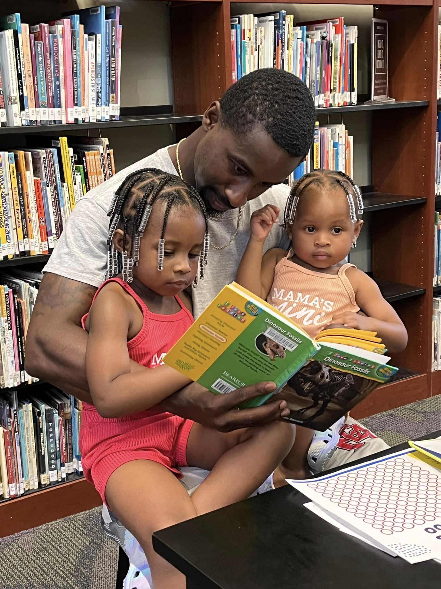 Children and families participating in a CMRLS reading challenge