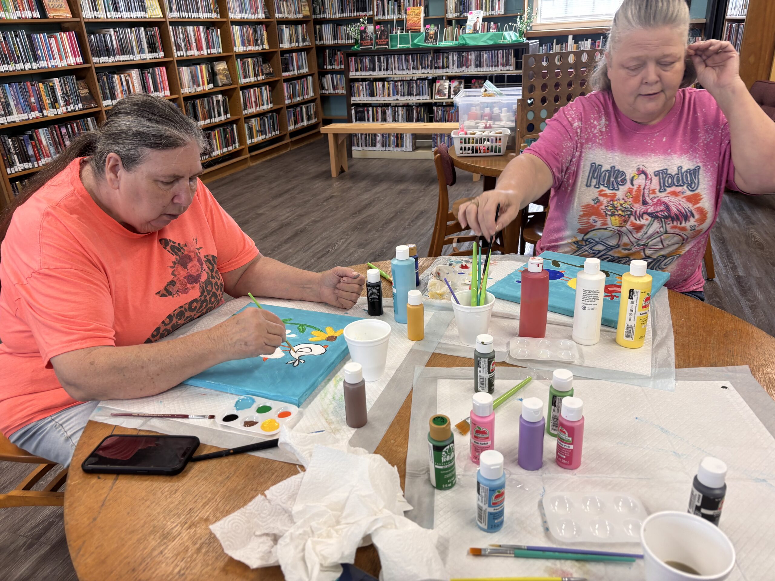 Adults participating in a library workshop