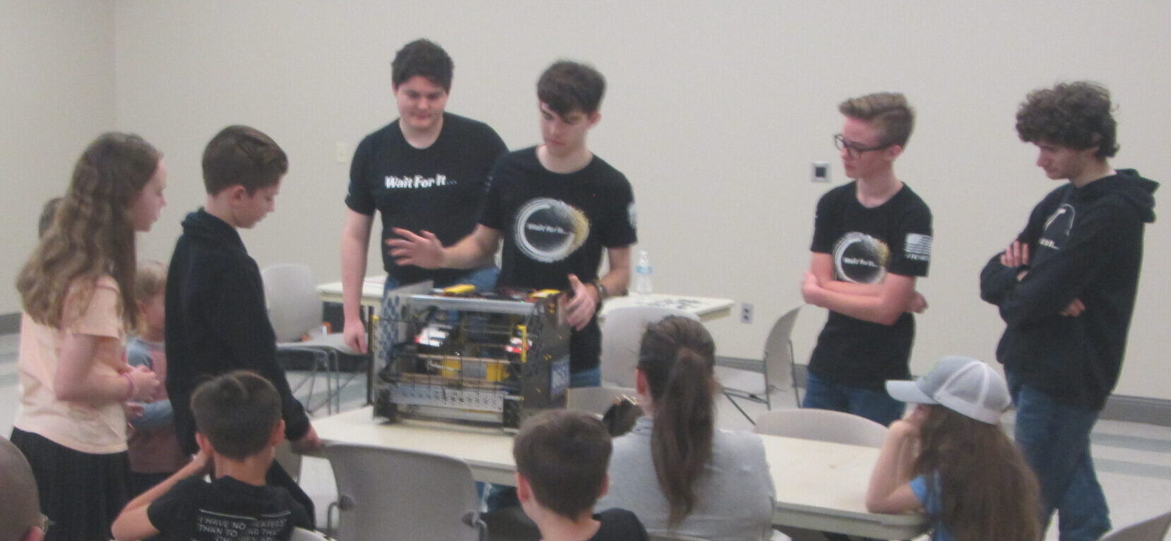 Teens participating in a library program