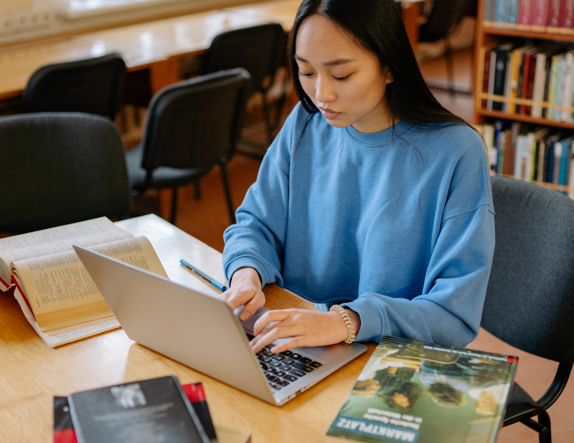 Patron sending a wireless print job from a laptop